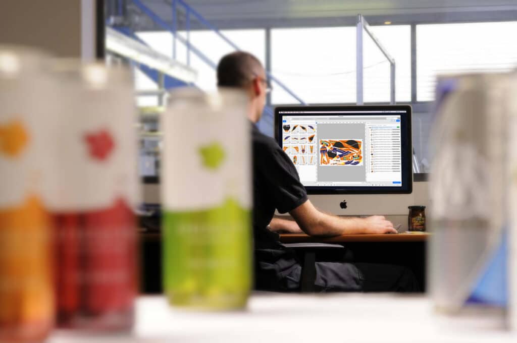 Prepress operator using  Caldera PrimeCenter to prepare files for production